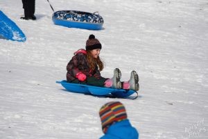 Welcome to Winter Festival | Girl Sledding