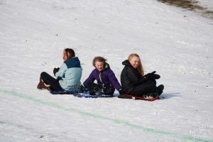 Welcome to Winter Festival | Three Girls Sledding